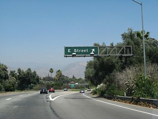 E Street heads south to Downtown San Bernardino and north onto Kendall Drive east of the Shandin Hills.
