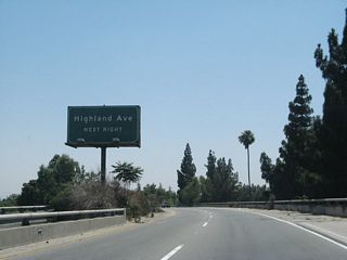 SR 18 Business lined Highland Avenue east from Exit 1 B to Sierra Way. The business designation was a throwback to when SR 18 used to continue southwest along SR 259, Interstate 215, and SR 91 toward Long Beach. That state route was retracted in the mid-1960s.