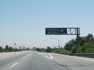 Entering the diamond interchange (Exit 1 B) with Highland Avenue in San Bernardino on SR 259 south.