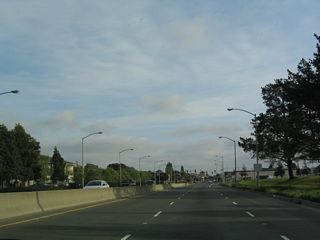 As California 260 enters the downtown area of Alameda, the highway changes from a limited access/substandard freeway into a city street.