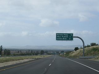 A second mileage sign on California 261 south again provides the distance to Exit 3, Portola Parkway; the Irvine Ranch Toll Plaza; and Exit 2, Irvine Boulevard.