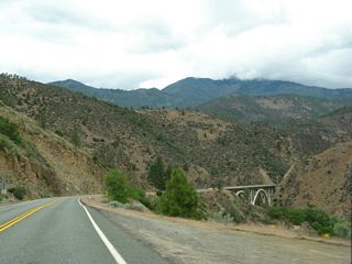 A double concrete arch bridge carries California 263 over the third Shasta River bridge (built 1931).
