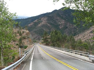 Two lanes of California 263 (Old U.S. 99) cross over the Shasta River via the Pioneer Bridge.