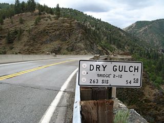 Southbound California 263 (Old U.S. 99) prepares to cross the 1929 Dry Gulch Bridge. This concrete arch bridge remains in use 85 years after installation.