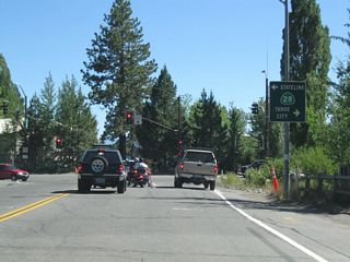 Turn left (east) on California 28 (North Tahoe Boulevard) to the California-Nevada state line at Crystal Bay. Nevada 28 continues from that point east to Incline Village, then turns south through Lake Tahoe-Nevada State Park to meet U.S. 50 at Spooner Junction. To the west, California 28 travels through Tahoe Vista and Carnelian Bay to its junction with California 89 in Tahoe City.