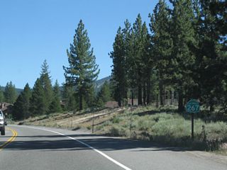 A California 267 reassurance shield is posted after the intersection with Brockway Road.