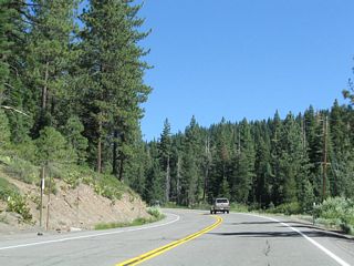Climbing the rim to the summit, California 267 retains two lanes, one in each direction with limited sight distance at certain curves. Passing is limited.
