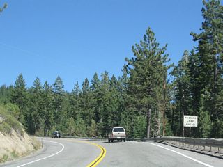 Coming around a blind corner, the passing lane begins. We're almost to the top of the summit.