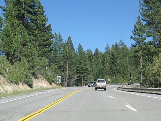 Two lanes continue east along California 267 while one lane travels west.