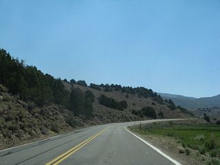 Continuing to parallel Clearwater Creek, SR 270 (Bodie Road) travels eastward by Mormon Meadow.