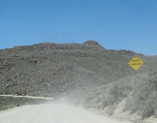 This "gate ahead" sign is the only sign along Bodie Road preceding the paved segment of California 270.