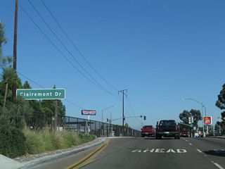 Eastbound Balboa Avenue (old California 274) approaches Clairemont Drive. Turn left (north) to the Clairemont Town Center and right to return to Interstate 5 via Bay Park.
