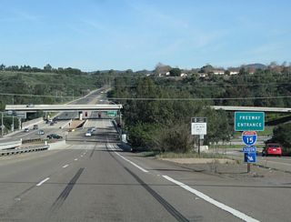 A freeway entrance shield is posted for Interstate 15 south.