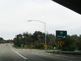 Eastbound Balboa Avenue (old California 274) meets the loop ramp to Interstate 15 north to Mira Mesa, Scripps Ranch, Rancho Bernardo and Escondido.