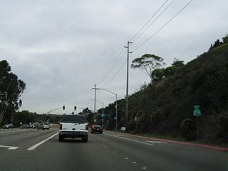 The first California 274 east reassurance shield posted along Balboa Avenue preceded the signalized intersection with Moraga Avenue.