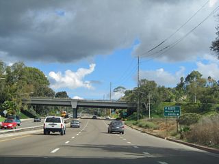 A parclo interchange joining Balboa Avenue with Morena Boulevard north to the Bay Ho neighborhood and south to the Bay Park neighborhood follows.