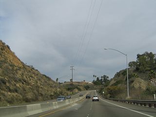 Tecolote Canyon Natural Park is a finger canyon located within the Clairemont community of the city of San Diego. Balboa Avenue passes through the northern end of the canyon before ascending back to Clairemont Mesa.