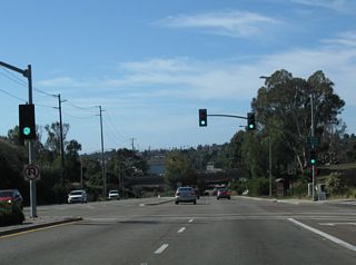 Westbound Balboa Avenue meets Moraga Avenue at this signalized intersection.
