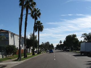 Three lanes carry eastbound traffic on Fourth Street (California 282). The state route is currently unsigned along eastbound, since the eastbound reassurance shield and end shield are both gone as of 2008. Permitted parking is available on either side of Fourth Street.