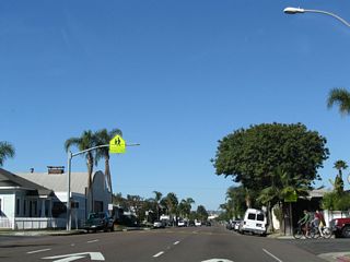 Residences line both sides of this busy commuter corridor. The U.S. Navy base generates substantial traffic, especially at shift changes. Watch for heavy traffic during morning and afternoon commuting hours.