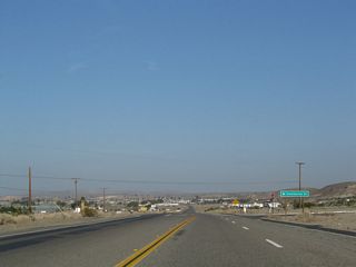 Hawthorne Drive stems south from Old Highway 58 into an adjacent subdivision.