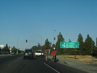 Covell Boulevard meets SR 113 at a diamond interchange (Exit 29). This freeway leads north to Woodland and Interstate 5 en route to Redding.