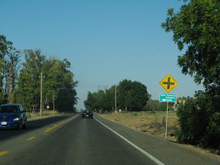 Road 95 stems north from Russell Boulevard (Road 32) and crosses CR E6 (Road 31) en route to Yolo County Airport (DWA).