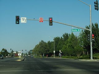 Development got underway along the north side of Covell Boulevard leading east to the traffic light with Shasta Drive in 2024. Sutter Davis Hospital is to the northeast of Rising Court.