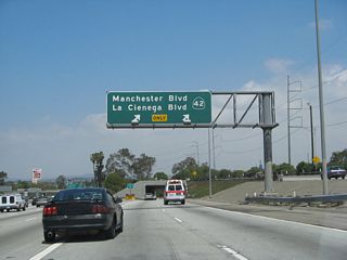 Although not part of the state highway system, this series of photos profiles La Cienega Boulevard as it leads north from Interstate 405 toward Interstate 10. In this photo, La Cienega Boulevard splits off Interstate 405 (San Diego Freeway) at the California 42/Manchester Boulevard interchange.