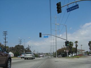 Northbound La Cienega Boulevard meets La Tijera Boulevard at this traffic signal.