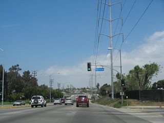 Immediately thereafter, northbound La Cienega Boulevard meets Fairview Boulevard at this traffic signal.