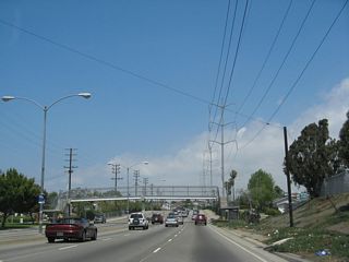 A pedestrian bridge crosses La Cienega Boulevard to allow residential access to a school on the east side of La Cienega Boulevard.