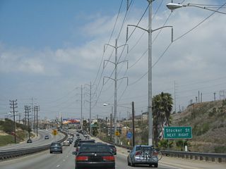 The next traffic signal along La Cienega Boulevard north is with Stocker Street (next right). Yes, the freeway (briefly) ends ahead.