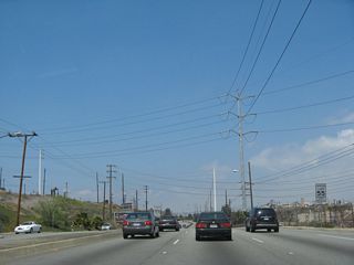 The tall power lines that have lined La Cienega Boulevard since leaving Interstate 405 finally split away after the Stocker Street intersection.