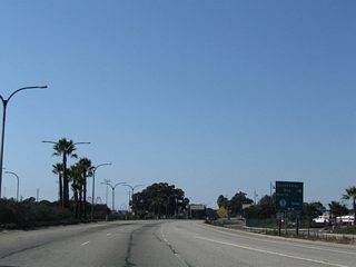 The off-ramp from Harbor Scenic Drive north to Queensway Drive loops makes a U-turn back toward Pier H.