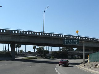 Northbound Harbor Scenic Drive meets Queens Way north to Downtown Long Beach.