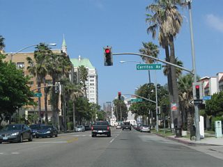 Back to back traffic signals operate along Ocean Boulevard west at Cerrittos Avenue south and 3rd Place.