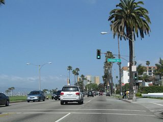 Temple Avenue leads north from the ensuing westbound signal to the Bluff Heights neighborhood.