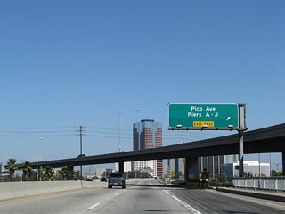 Eastbound Ocean Boulevard at Pico Street and Piers A through J. Ahead, Ocean Boulevard crosses over the Los Angeles River.