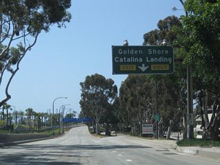 The off-ramp from Queens Way southbound to Golden Shore Street and Catalina Landing departs after the bridge over Shoreline Drive.