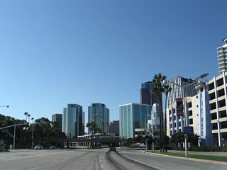 A large parking garage is located next to The Pike market on the north side of Shoreline Drive.