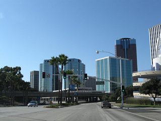 The Downtown Long Beach skyline rises just west the intersection with Queens Way south and Chestnut Place north. A wye interchange joins Shoreline Drive with Queens Way, which is a freeway all the way to the parking entrance for the Queen Mary and Cruise Ship Terminal.