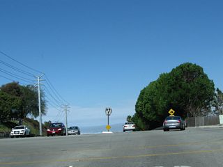 At the intersection with Crest Road, northbound Crenshaw Boulevard reaches its highest elevation on top of Rancho Palos Verdes.