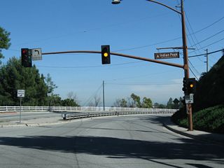Northbound Crenshaw Boulevard meets Indian Peak Road in Rolling Hills Estates.