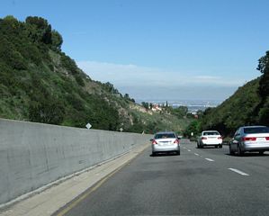 Occasional glimpses of the Los Angeles Basin can be had from Crenshaw Boulevard northbound.