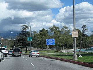 Eastbound Los Feliz Boulevard passes by the William Mulholland Memorial Fountain.
