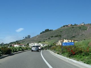 Westbound Palos Verdes Drive South approaches Palos Verdes Drive East.