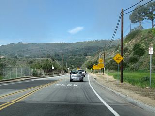 This section of Palos Verdes Drive South was impacted by a shifting coastal bluff. Land here is constantly in motion, resulting in the need for road repairs to keep it passable. Large warning signs advise of the unstable ground for this nearly one-mile stretch.