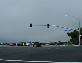 Northbound Palos Verdes Drive West meets CR N-7 (Hawthorne Boulevard). The signed county road begins at this intersection and climbs over the mountain before descending into Torrance. At the intersection with SR 1, Hawthorne Boulevard becomes SR 107.