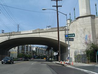 Riverside Drive approaches the arched Hyperion Avenue overpass. An on-ramp connects Riverside Drive to Interstate 5 (Golden State Freeway).